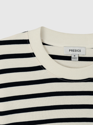 Stripe White/Navy|Black and white striped t-shirt on a light gray background|Stripe White/Navy