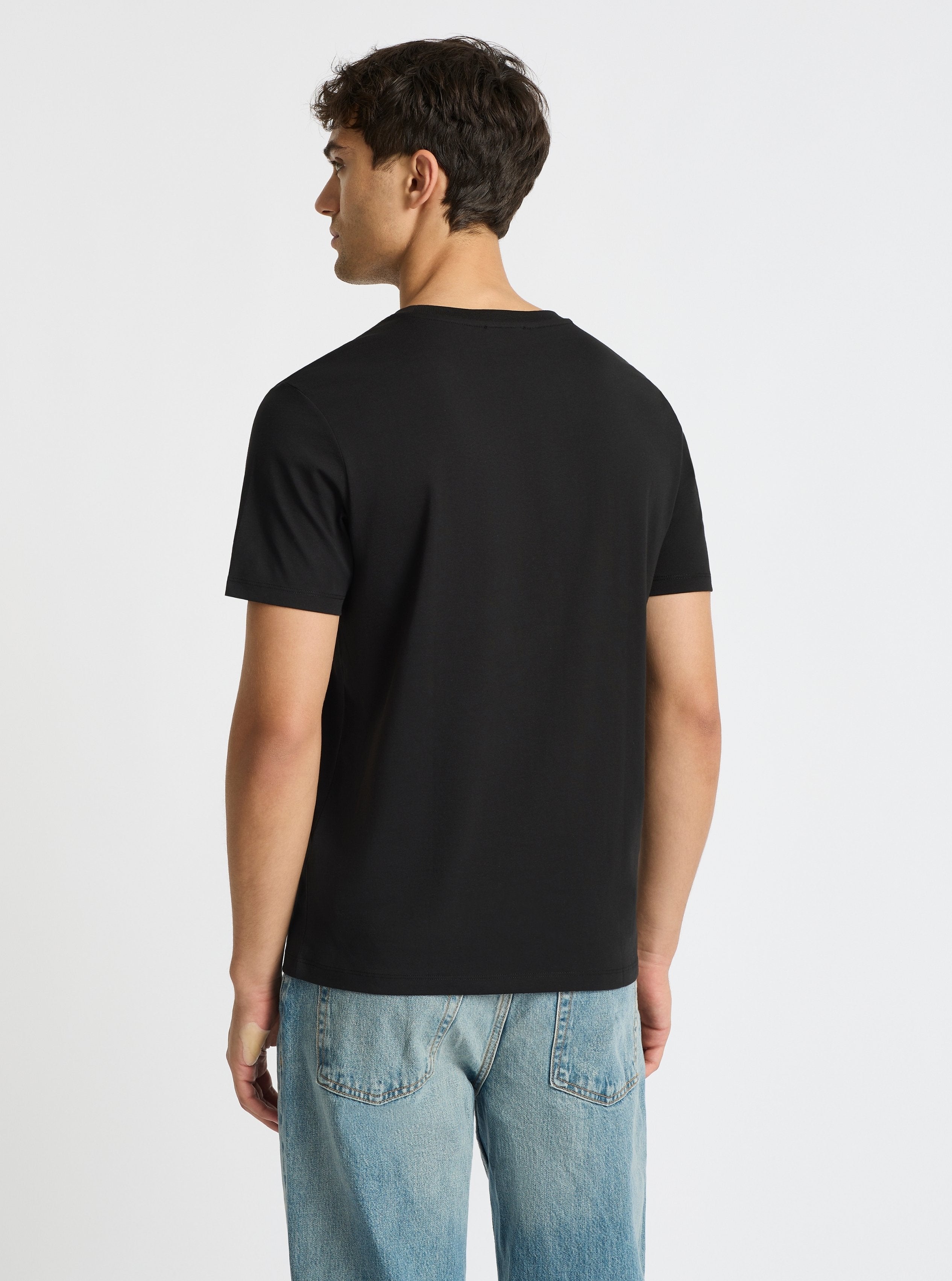 Black|Good Earth Cotton® Classic Tee – Sustainable Cotton T-shirts|Evans is 6’2” and wearing a size M