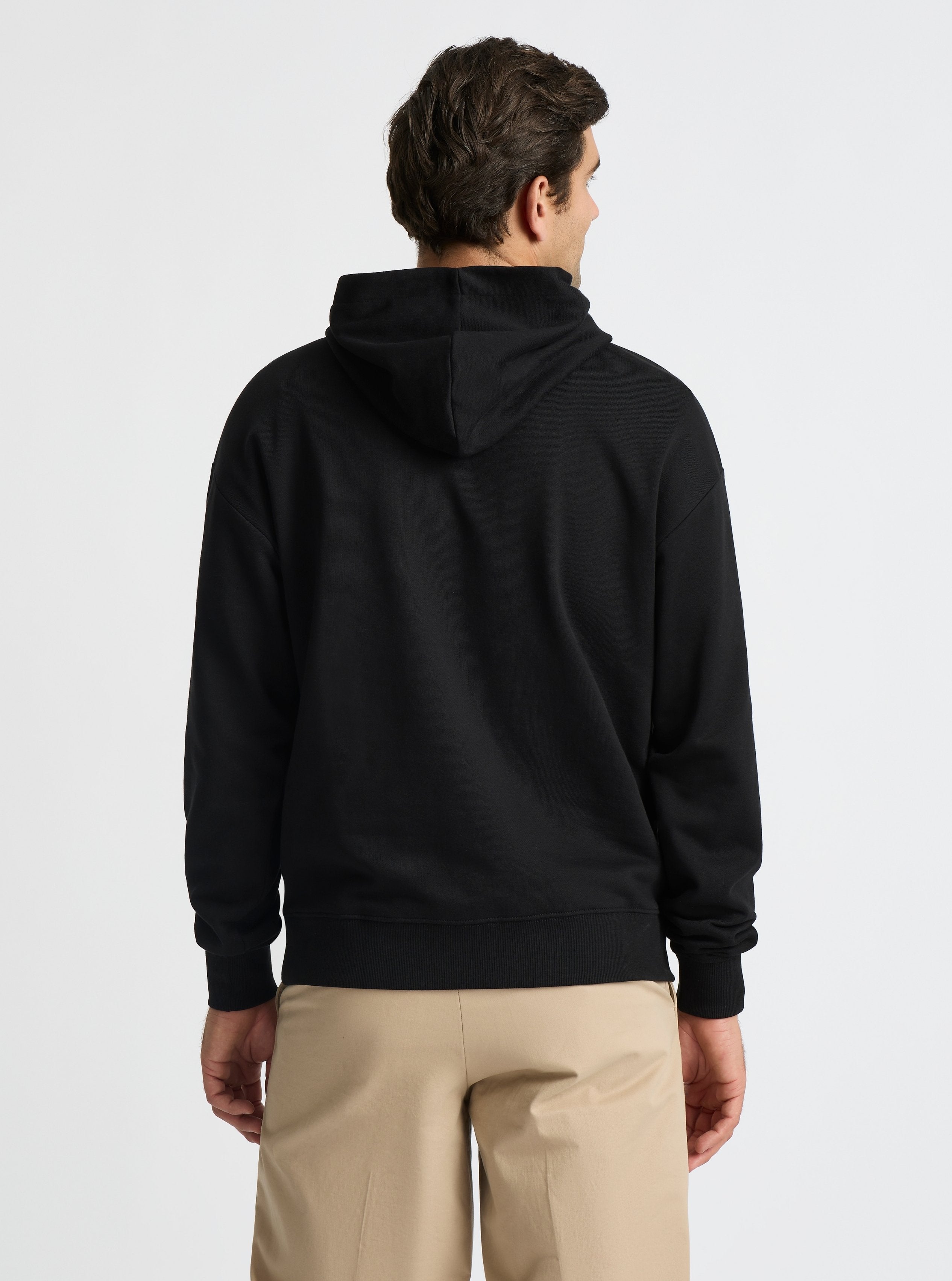 Black|Good Earth Cotton® Hoodie for men – Sustainable Cotton Hoodie|Jack is 6’2” and wearing a size L