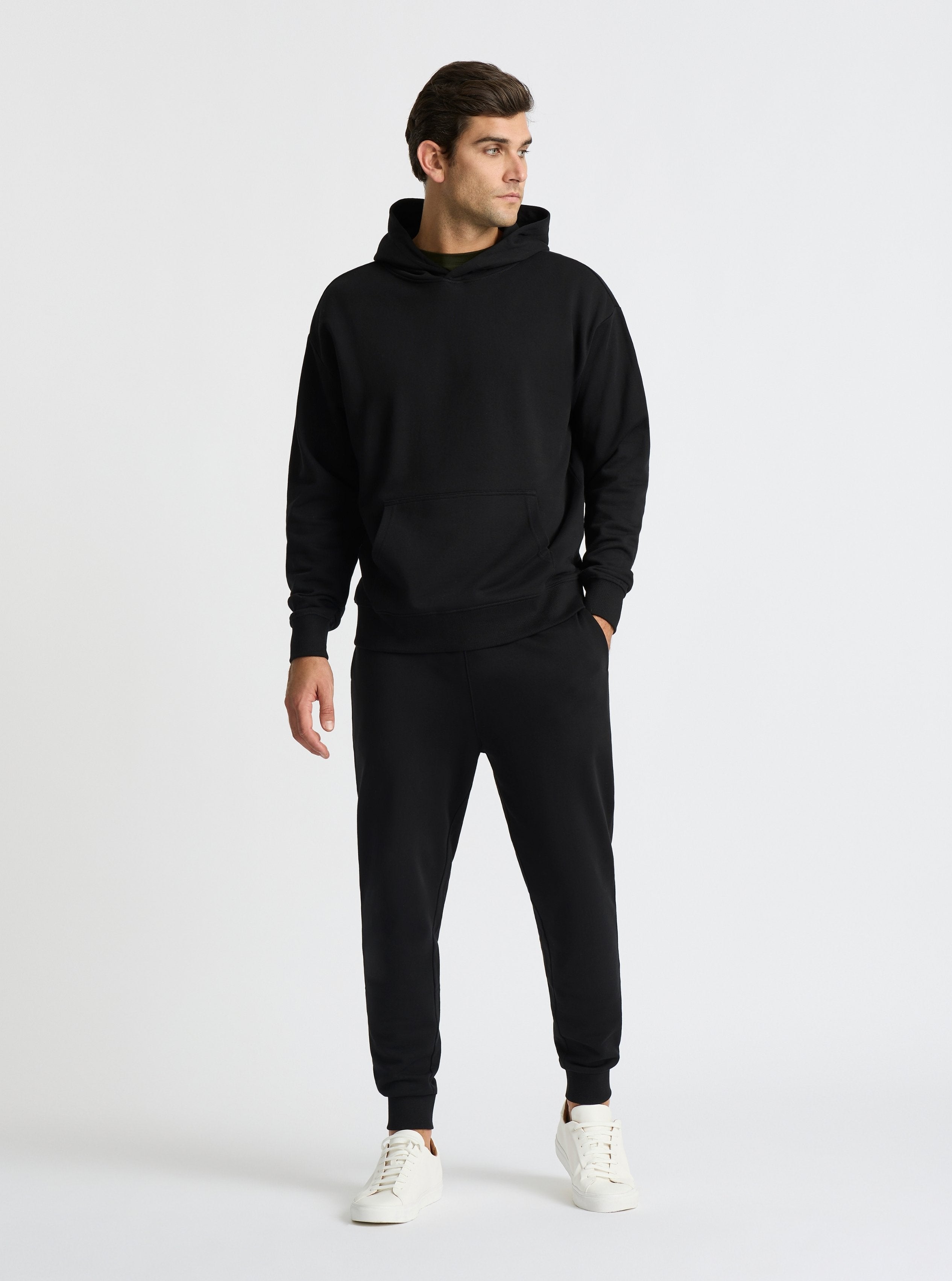 Black|Good Earth Cotton® Hoodie for men – Sustainable Cotton Hoodie|Jack is 6’2” and wearing a size L