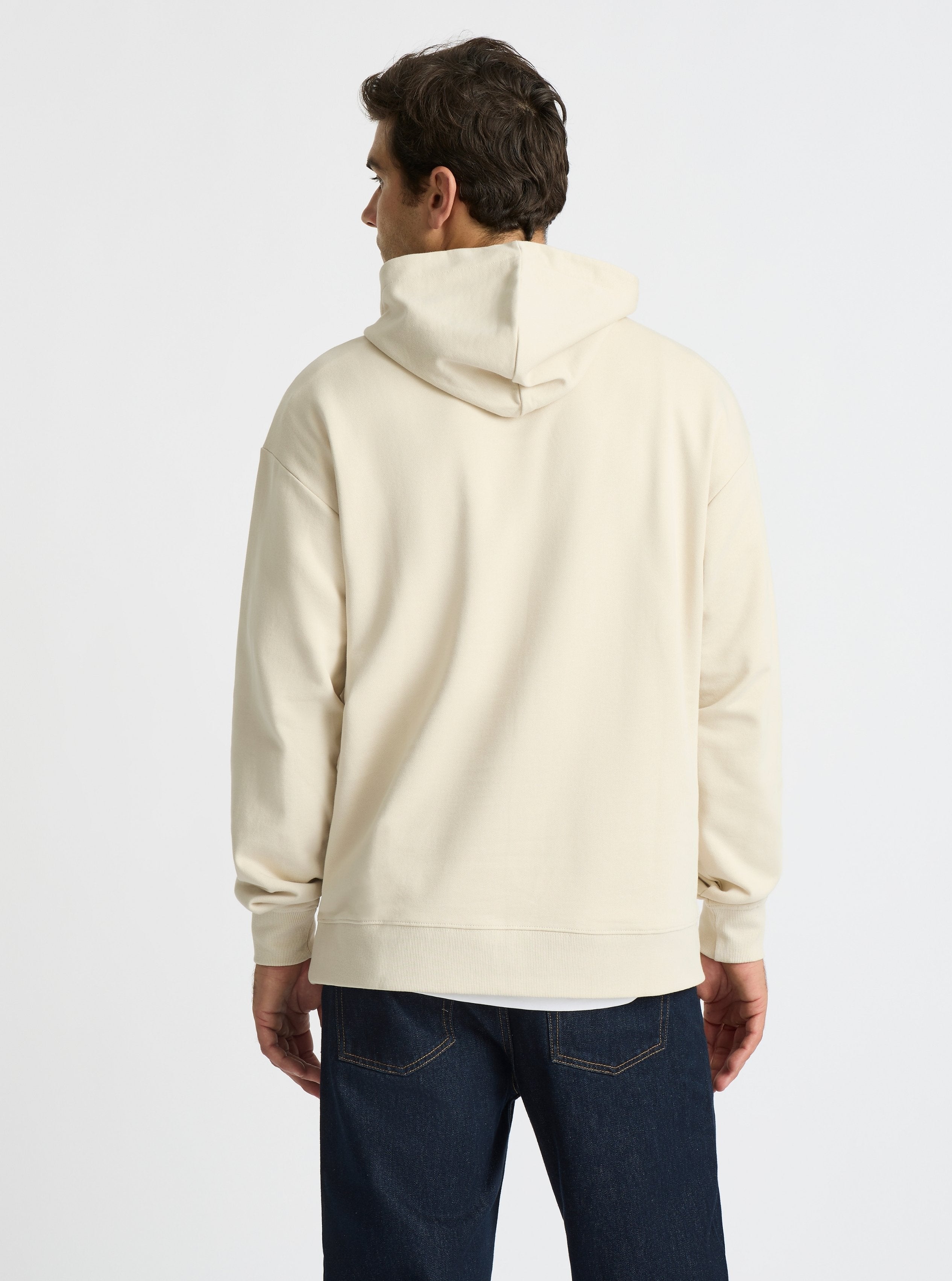 Ecru|Good Earth Cotton® Hoodie for men – Sustainable Cotton Hoodie|Jack is 6’2” and wearing a size L