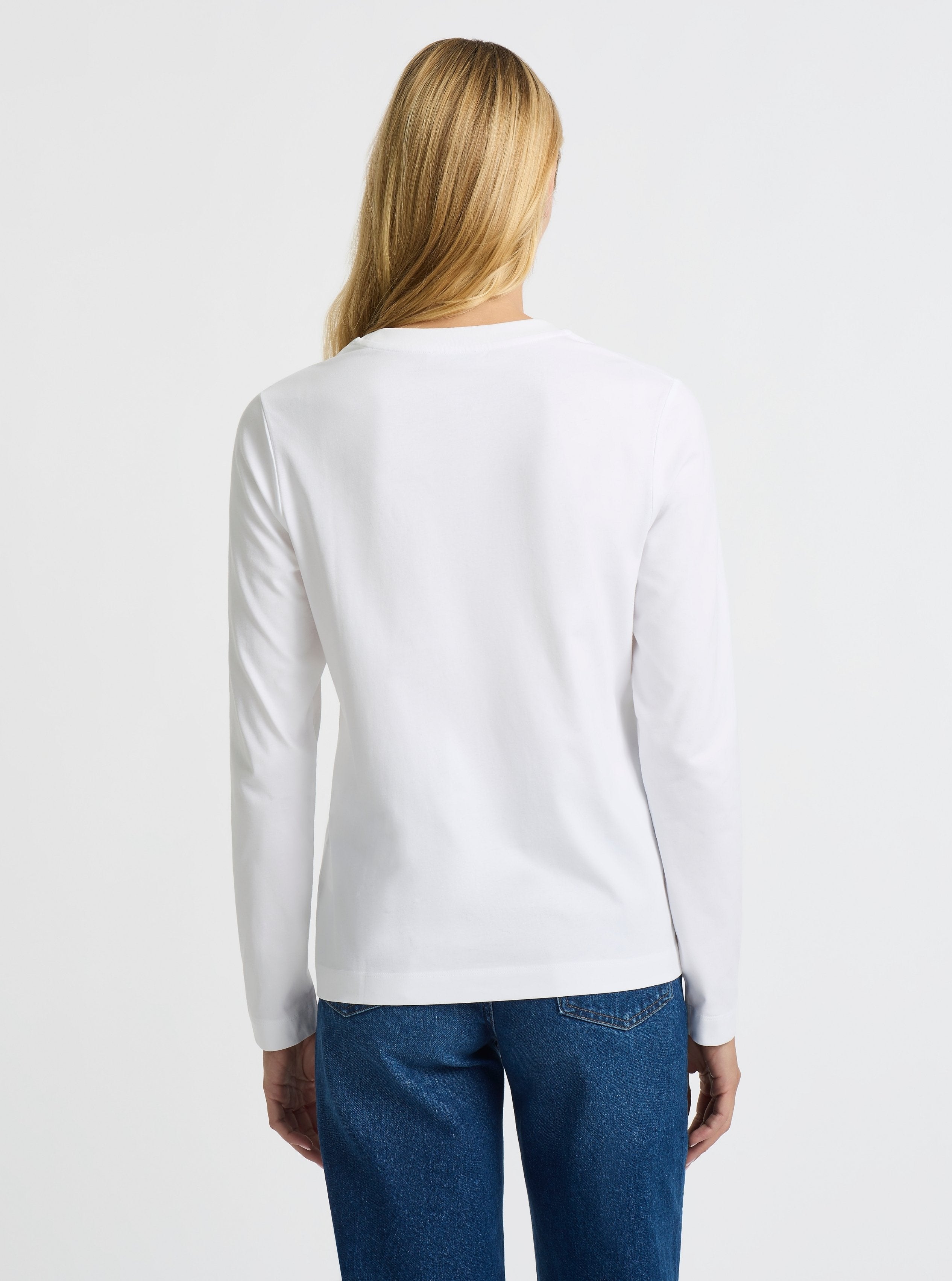 White|Good Earth Cotton® Long Sleeve Tee – Sustainable Cotton T-shirt|Karolina is 5'10" and wearing a size M