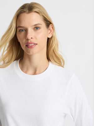 White|Good Earth Cotton® Long Sleeve Tee – Sustainable Cotton T-shirt|Karolina is 5'10" and wearing a size M
