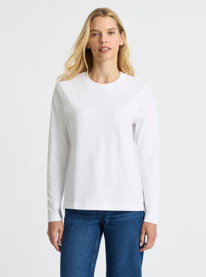 White|Good Earth Cotton® Long Sleeve Tee – Sustainable Cotton T-shirt|Karolina is 5'10" and wearing a size M