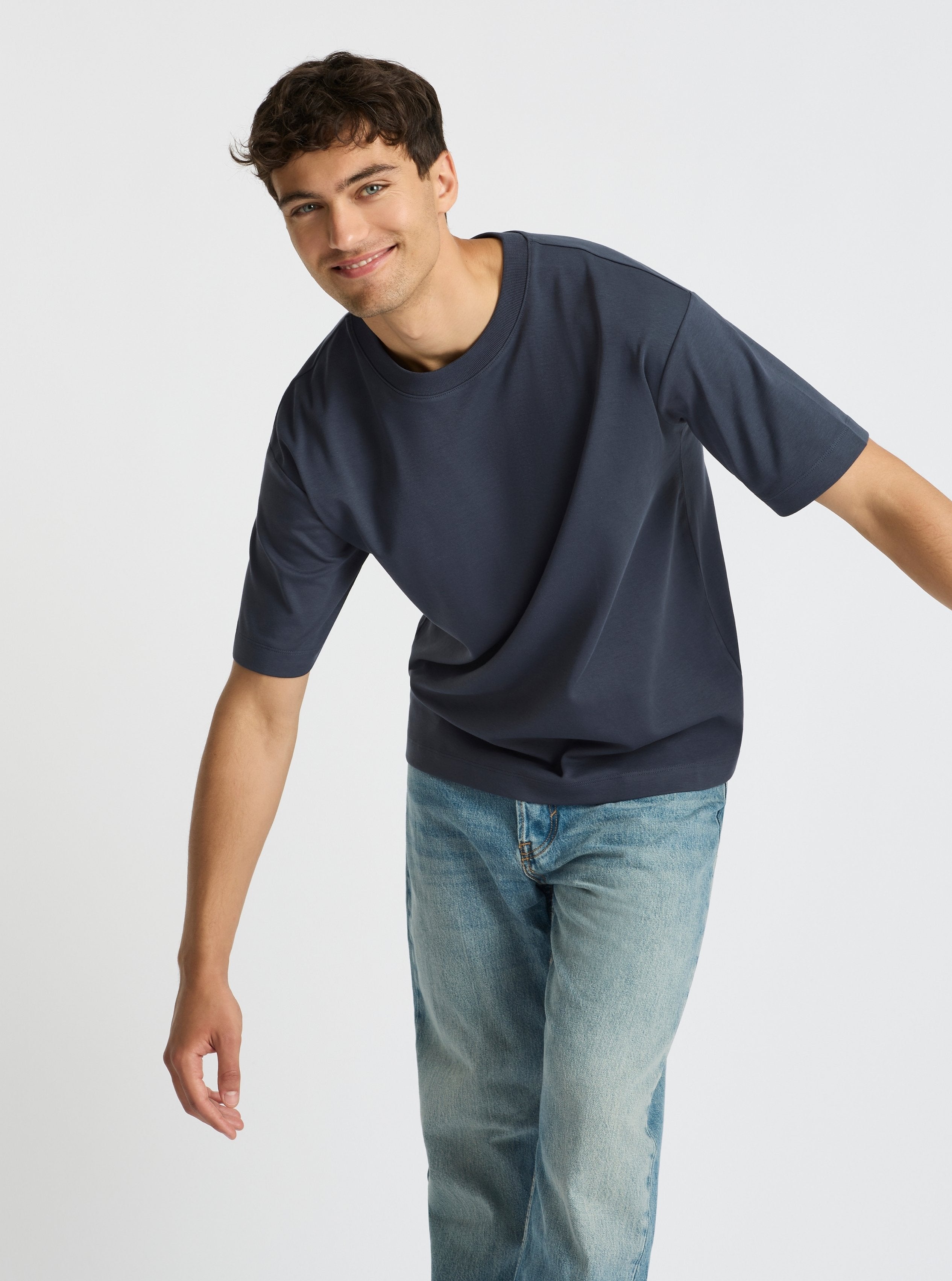 Charcoal Blue|Good Earth Cotton® Oversized Tee – Sustainable Cotton T-shirt|Evans is 6’2” and wearing a size M