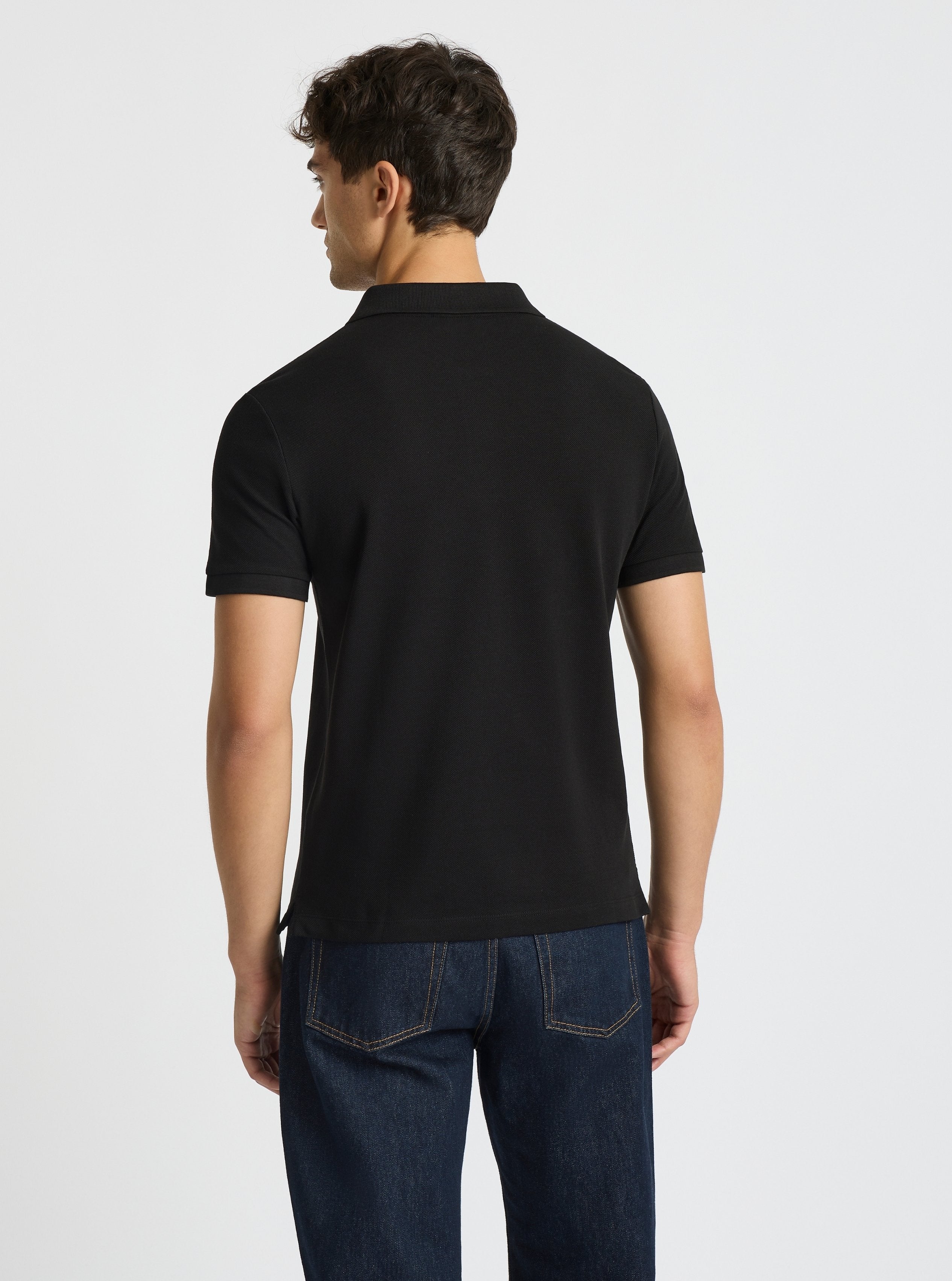 Black|Good Earth Cotton® Polo – Sustainable Cotton Polo|Evans is 6’2” and wearing a size M