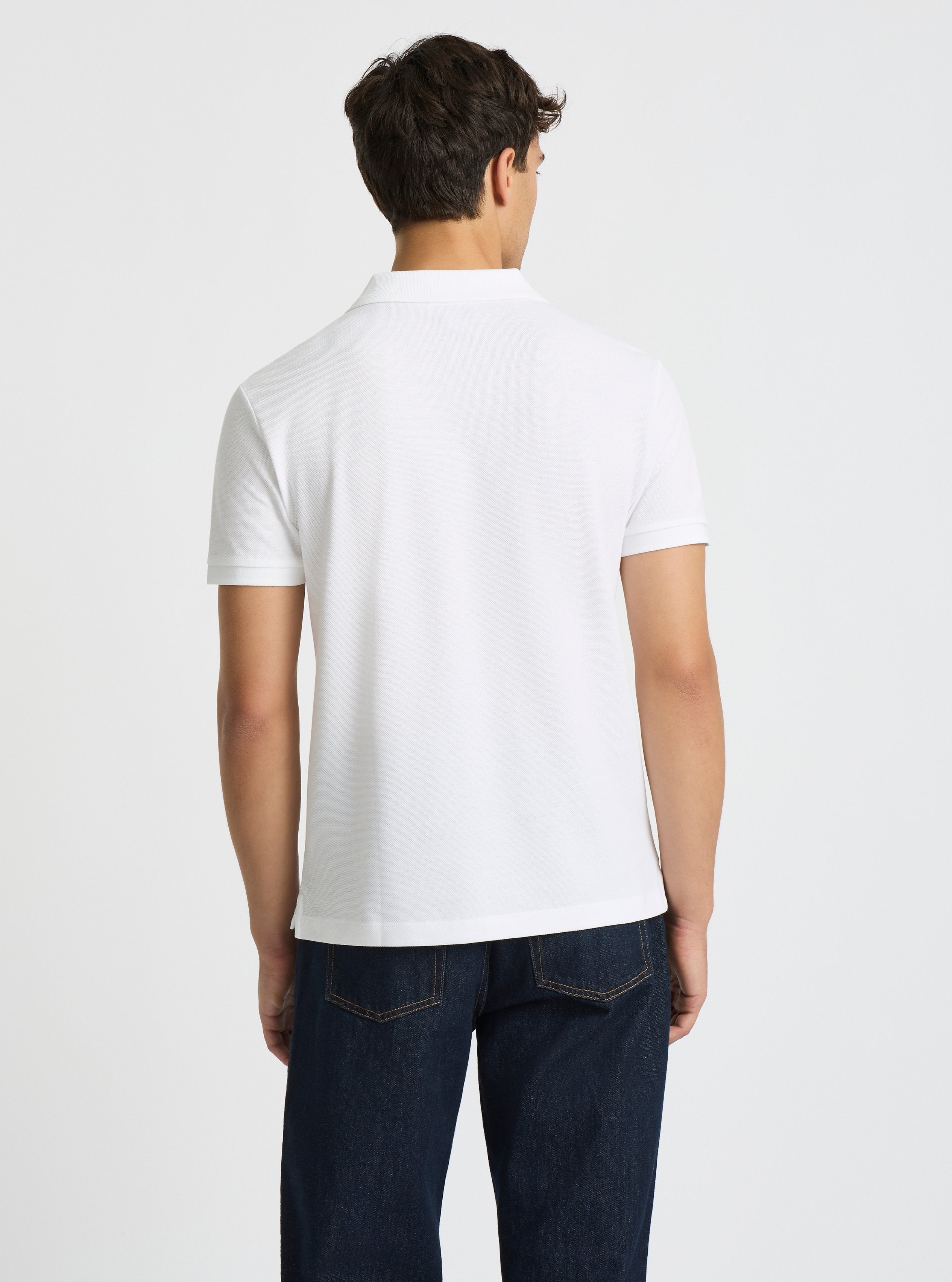 White|Good Earth Cotton® Polo – Sustainable Cotton Polo|Evans is 6’2” and wearing a size M
