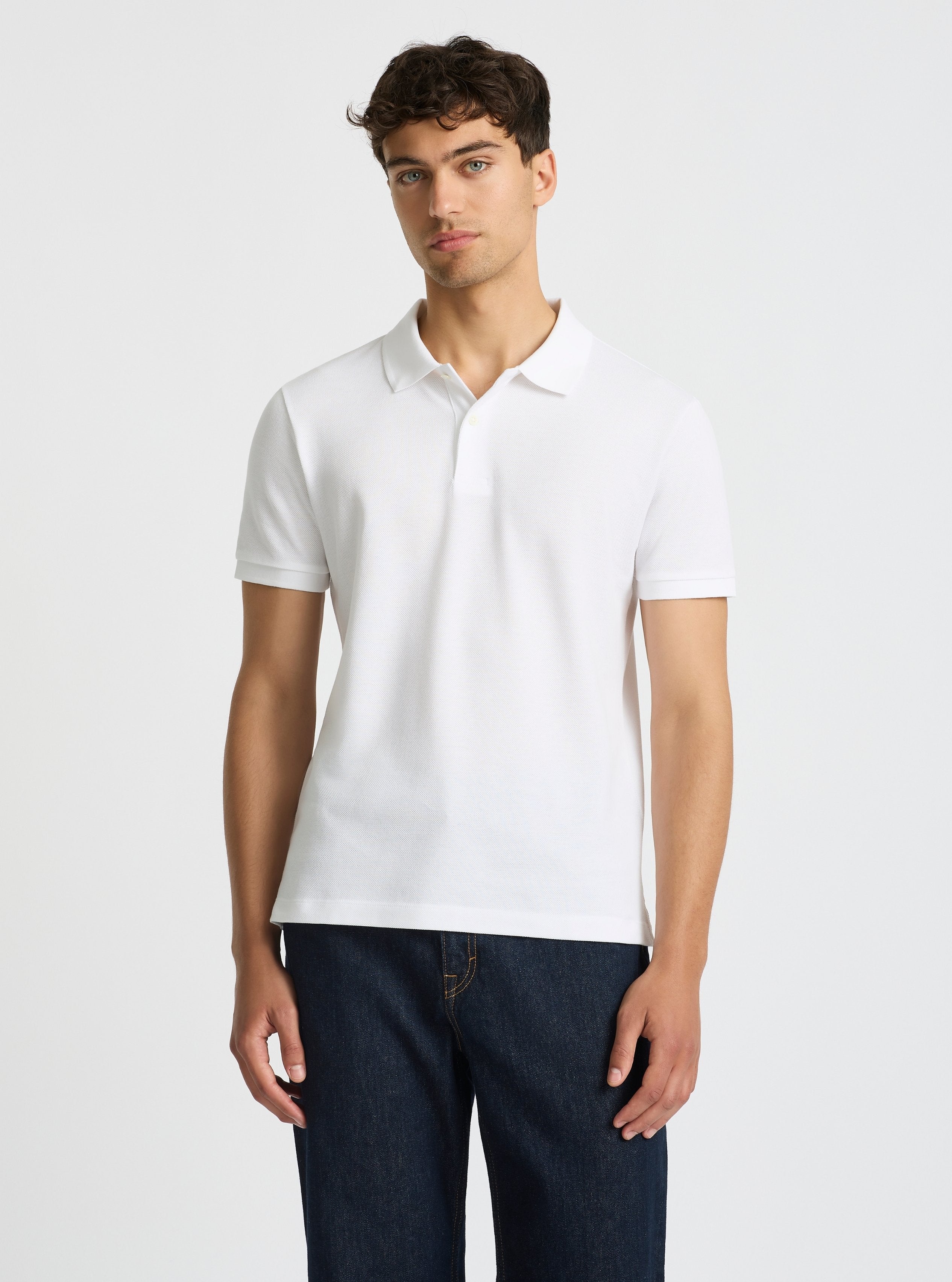 White|Good Earth Cotton® Polo – Sustainable Cotton Polo|Evans is 6’2” and wearing a size M