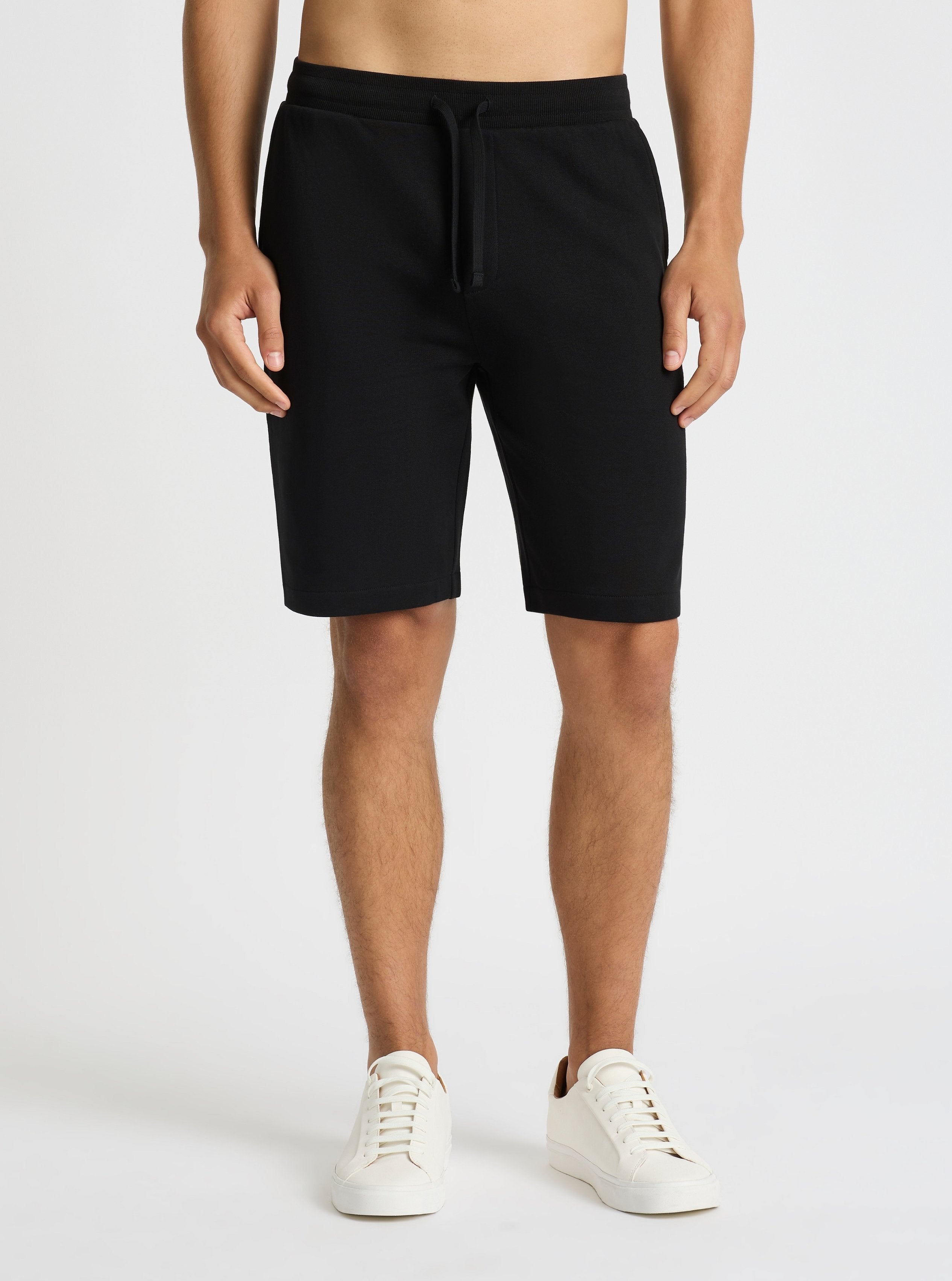 Black|Good Earth Cotton® Shorts – Sustainable Cotton Shorts|Evans is 6’2” and wearing a size M