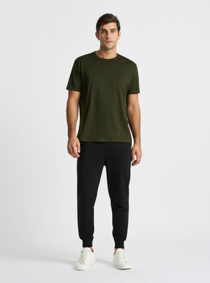 Black|Good Earth Cotton® Sweatpants for men – Sustainable Cotton Sweatpants|Jack is 6’2” and wearing a size L