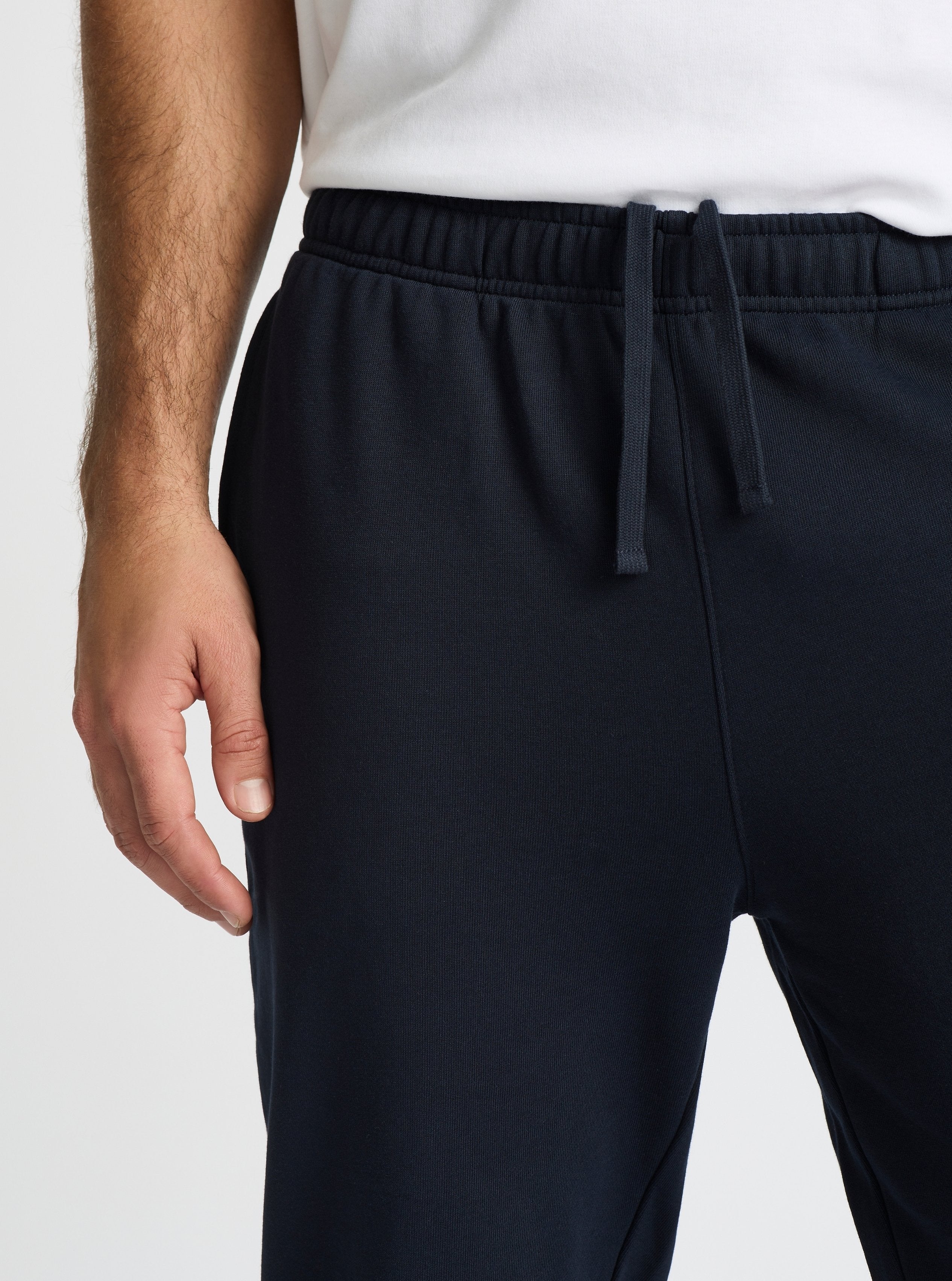 Navy|Good Earth Cotton® Sweatpants for men – Sustainable Cotton Sweatpants|Jack is 6’2” and wearing a size L