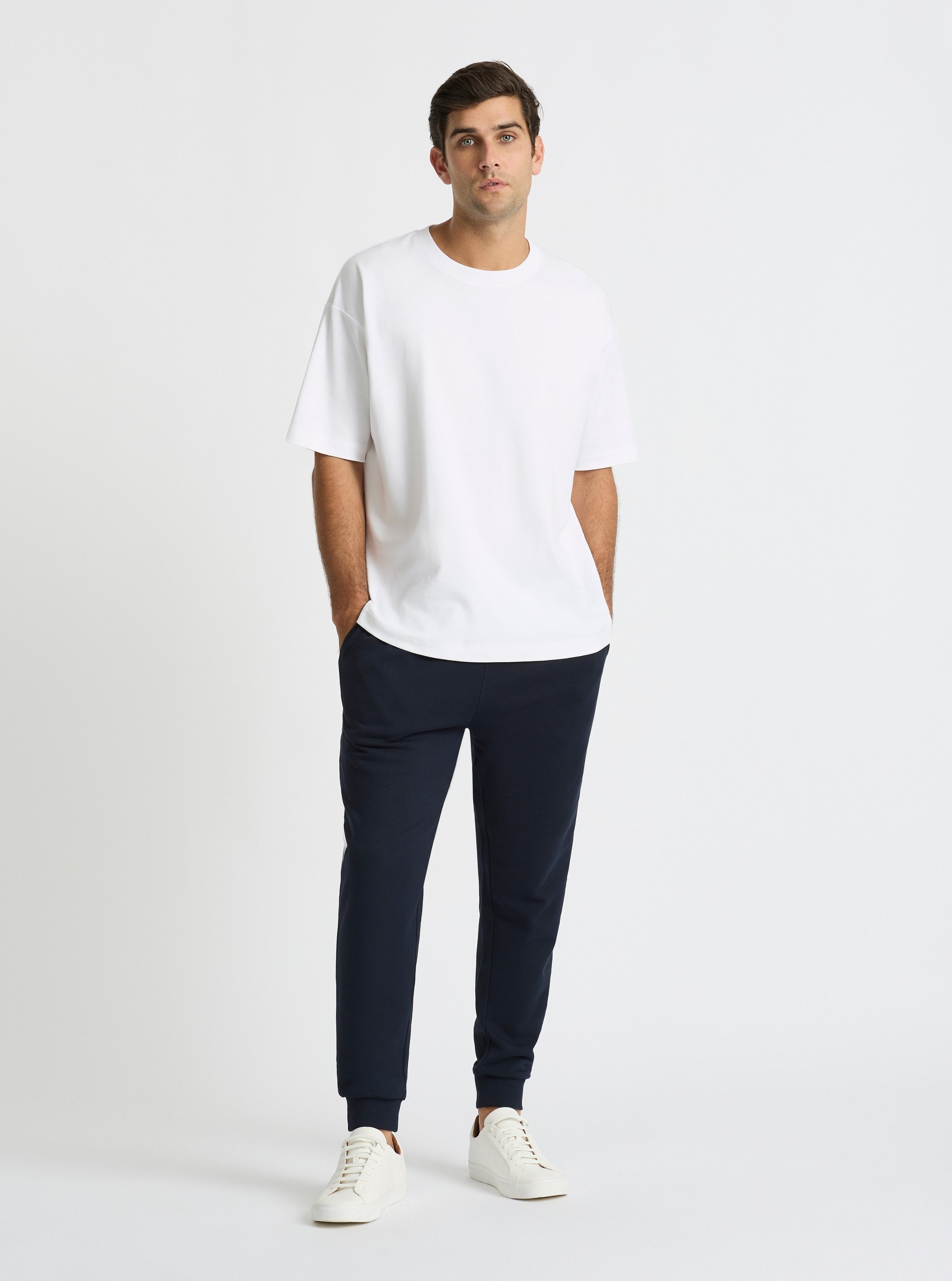 Navy|Good Earth Cotton® Sweatpants for men – Sustainable Cotton Sweatpants|Jack is 6’2” and wearing a size L