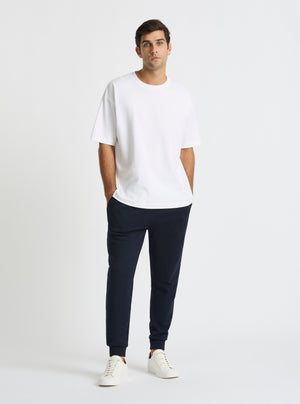 Navy|Good Earth Cotton® Sweatpants for men – Sustainable Cotton Sweatpants|Jack is 6’2” and wearing a size L