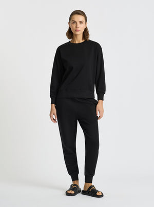 Black|Good Earth Cotton® Sweatshirts – Sustainable Cotton Sweatshirts|Stas is 5'10" and wearing a size S