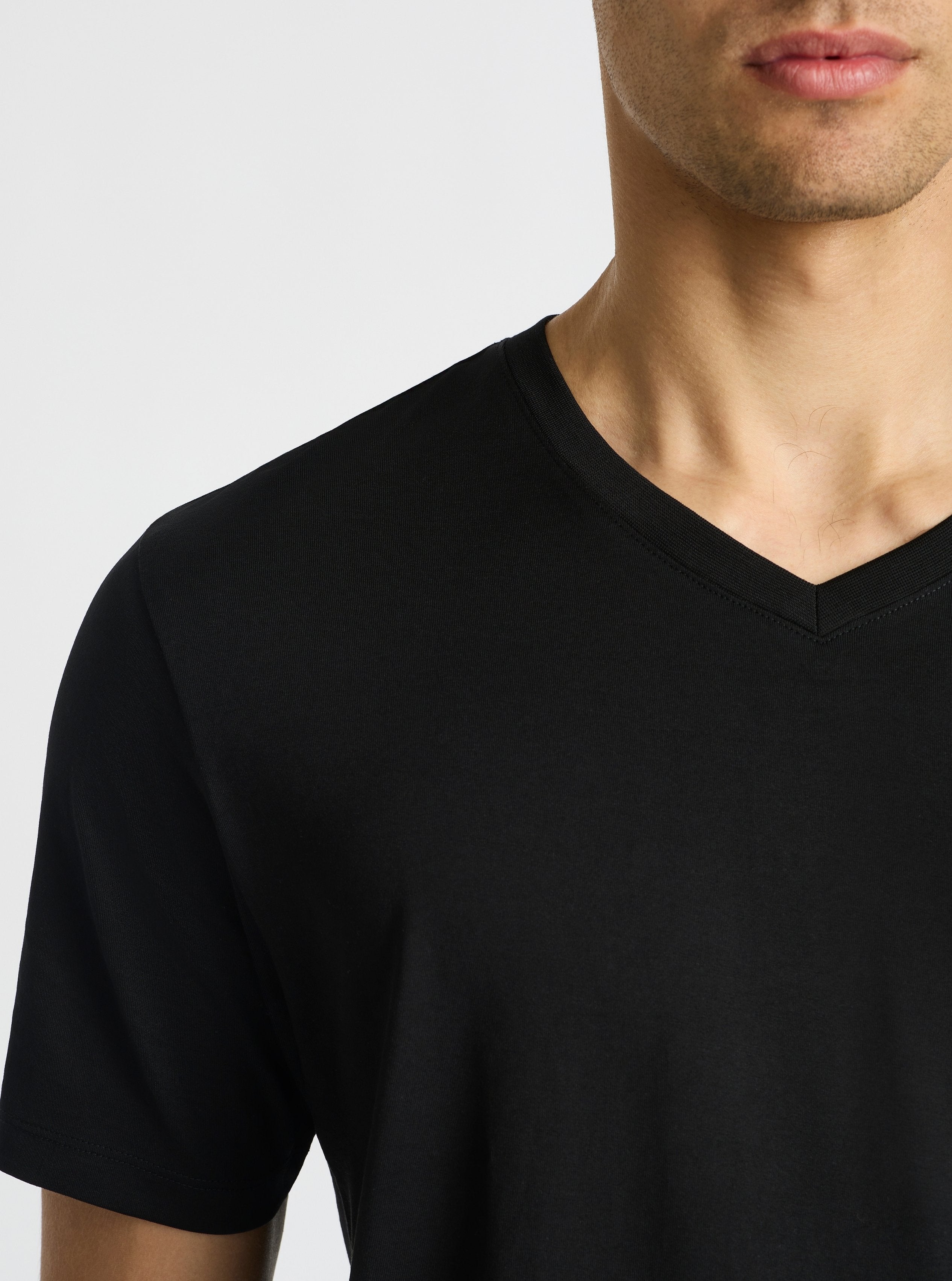 Black|Supima® Mercerised V-neck Tee for men – premium soft cotton t-shirt|Evans is 6’2” and wearing a size M