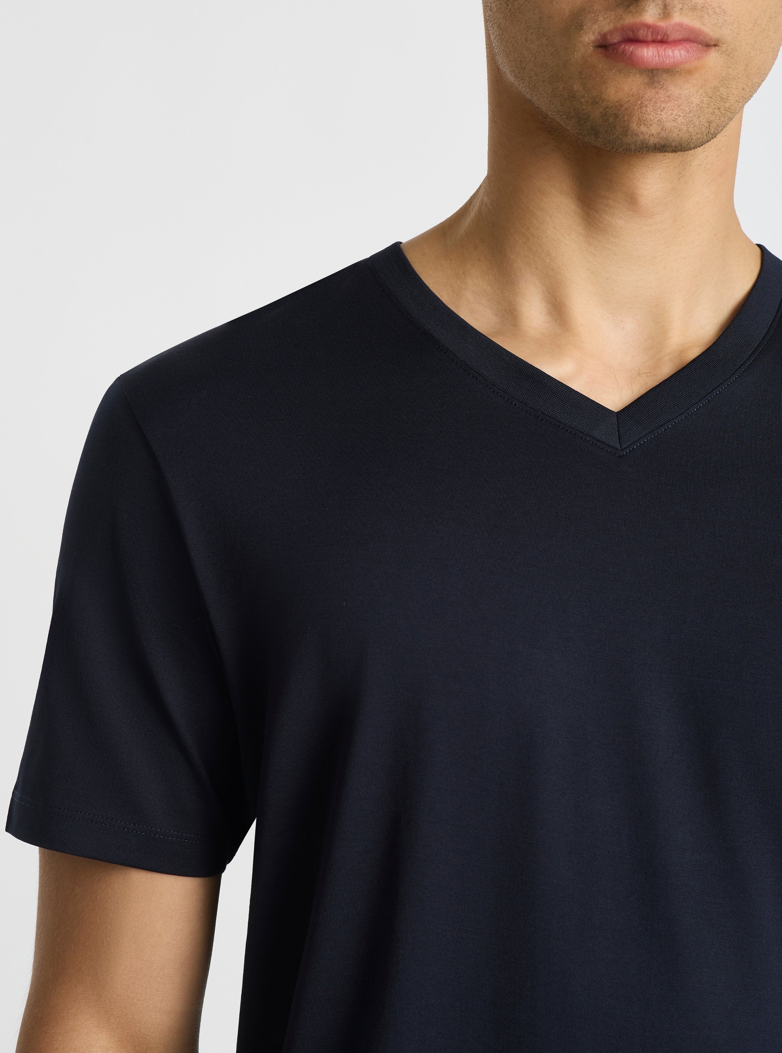 Dark Navy|Supima® Mercerised V-neck Tee for men – premium soft cotton t-shirt|Evans is 6’2” and wearing a size M