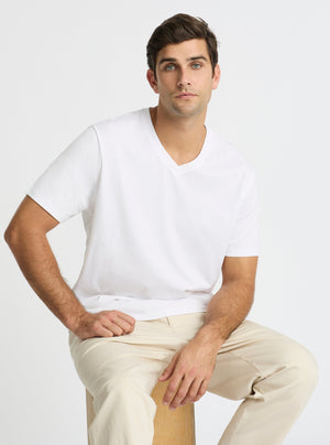 White|Supima® Mercerised V-neck Tee for men – premium soft cotton t-shirt|Jack is 6’2” and wearing a size L