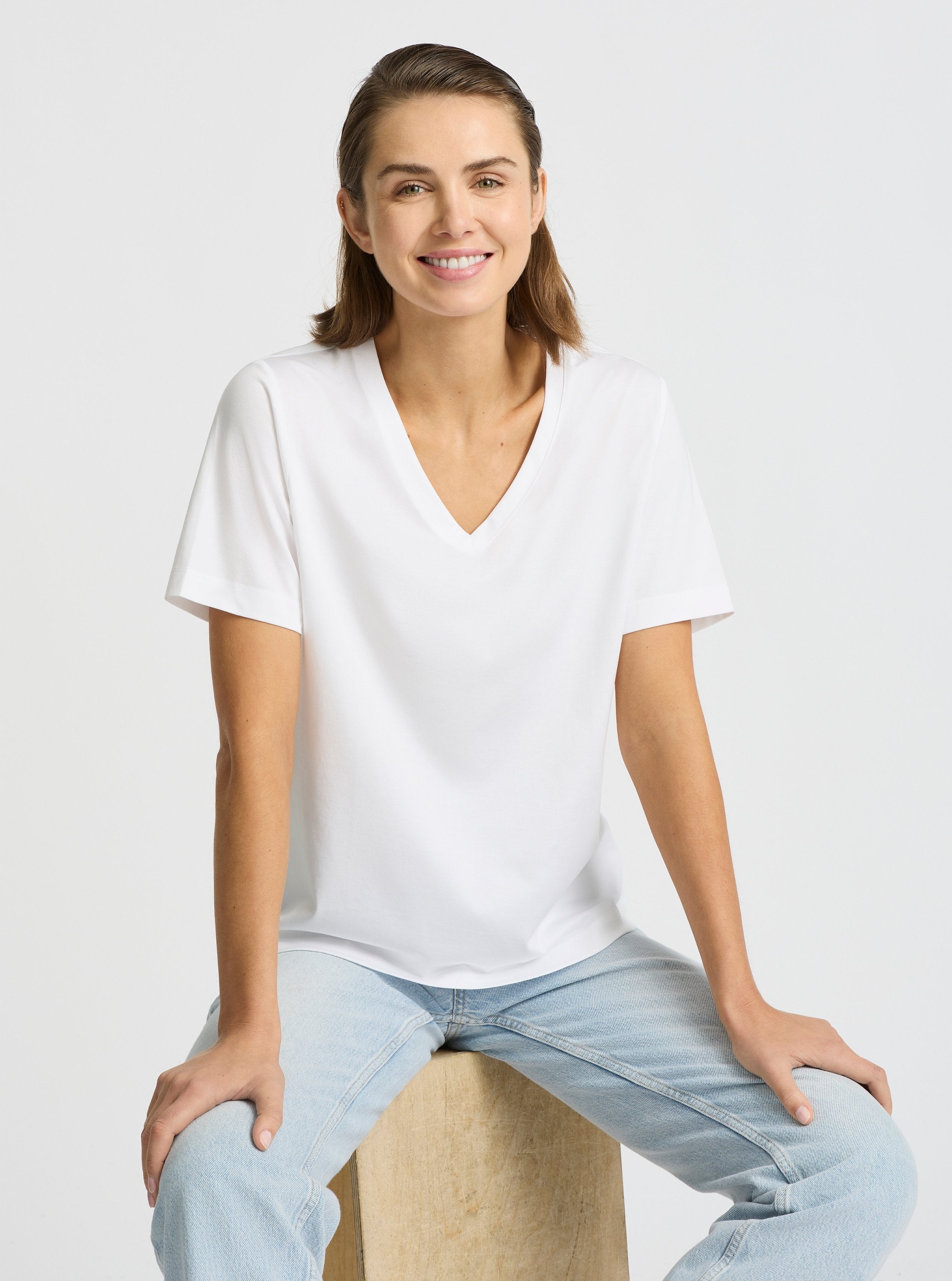 White|Supima® Mercerised V-neck Tee for women – premium soft cotton t-shirt|Stas is 5'10" and wearing a size S